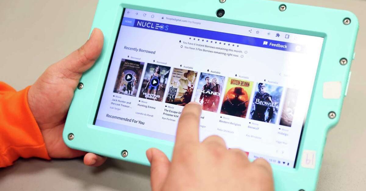 A Nucleos user browses library content on a secure iT1 tablet